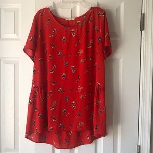 Pleione Ruffled Back Peplum top